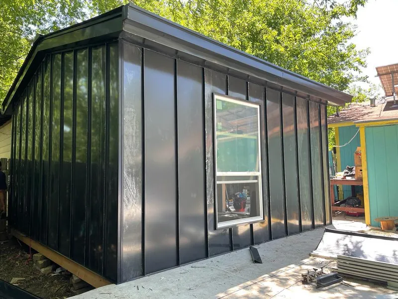 Black standing seam metal wall panels for Metal Roof Installation in Wauwatosa