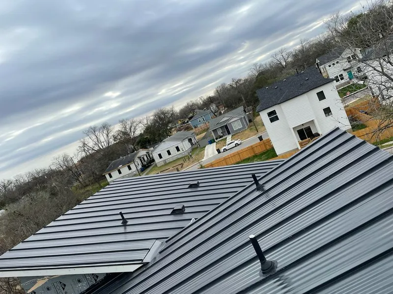 Standing seam metal roof panels with vents for Skylight Repair in Wauwatosa